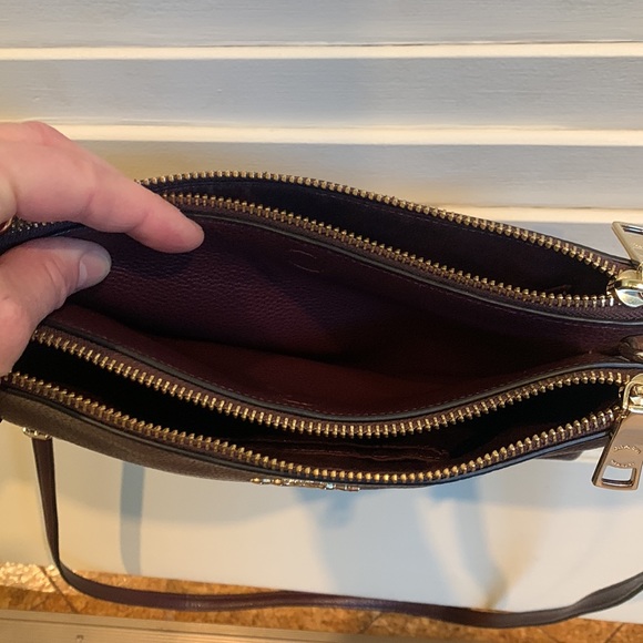 COACH crossbody purse. Leather mahogany/brown. 2 pocket adjustable strap. - Picture 5 of 7